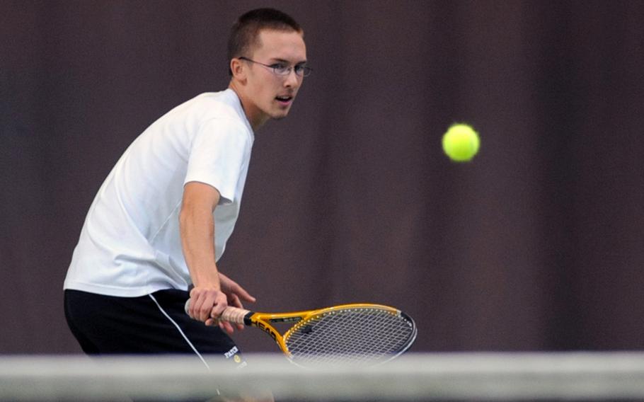 Jon Lightner of Patch backhands  a shot to Bitburg's Tyler Jakobs in their first-round match, won by Lightner won 6-1, 6-4 at the DODDS-Europe tennis championship tournament  in Wiesbaden on Thursday.