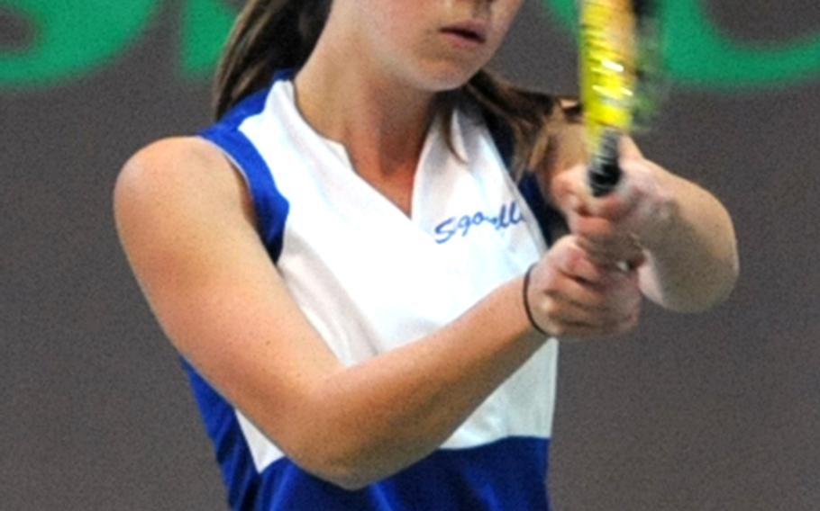 Sigonella's Kendra Coates returns a shot from Alconbury's Julia Caverly in her 6-0, 6-2 victory in opening day action at the DODDS-Europe tennis finals in Wiesbaden on Thursday.