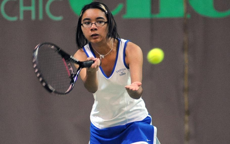 Ramstein's Michaela Corral, the tourney's eighth seed, keeps her eyes on the ball in her 6-2, 6-0 first-round win over AFNORTH's Hope Bonen Clark at the DODDS-Europe tennis finals in Wiesbaden on Thursday.