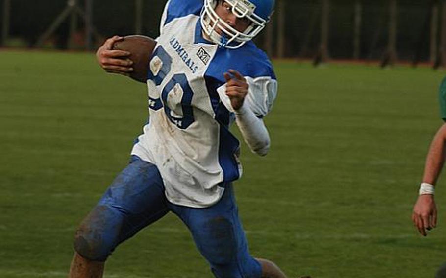 Rota's Cody Holland runs out of bounds as the time winds down in the fourth quarter against Alconbury. Two late touchdowns by Alconbury wrapped up a 34-14 win the the Division III semifinal playoff game