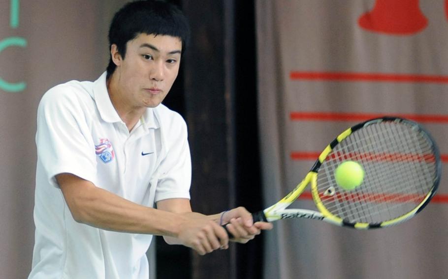 Second-seeded Patrick Tan of SHAPE returns a shot from Patch's Ajdin Tahirovic, the top seed, during the boys singles final. Tahirovic won the match 6-1, 6-2.