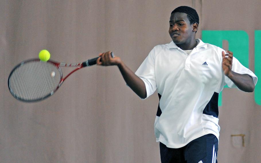 Heidelberg's Darien Ward returns a shot in the boys doubles final. Ward and teammate Jack Kolodziejski defeated Aaron Yip and Alvaro Sanchez of SHAPE 6-4, 7-5.