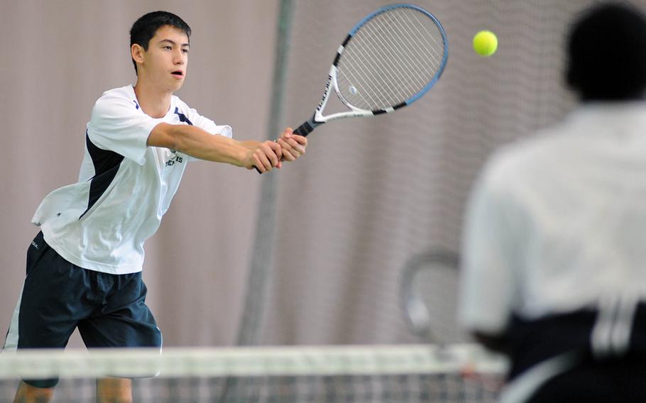 SHAPE's Aaron Yip, left, gets a ball past Heidelberg's Darien Ward in the boys doubles final. Ward and partner Jack Kolodziejski beat Yip and Alvaro Sanchez 6-4, 7-5.
