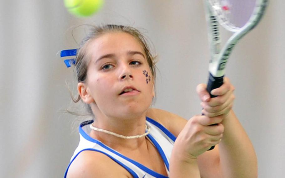 Ramstein's Olivia Rockwell returns a shot at the net in the girls doubles final against Taylor BonenClark and Stephanie Seitz. Rockwell and teammate Meghan Augsburger, the defending champions, lost the title match 6-3, 6-7 (6-8), 4-6.