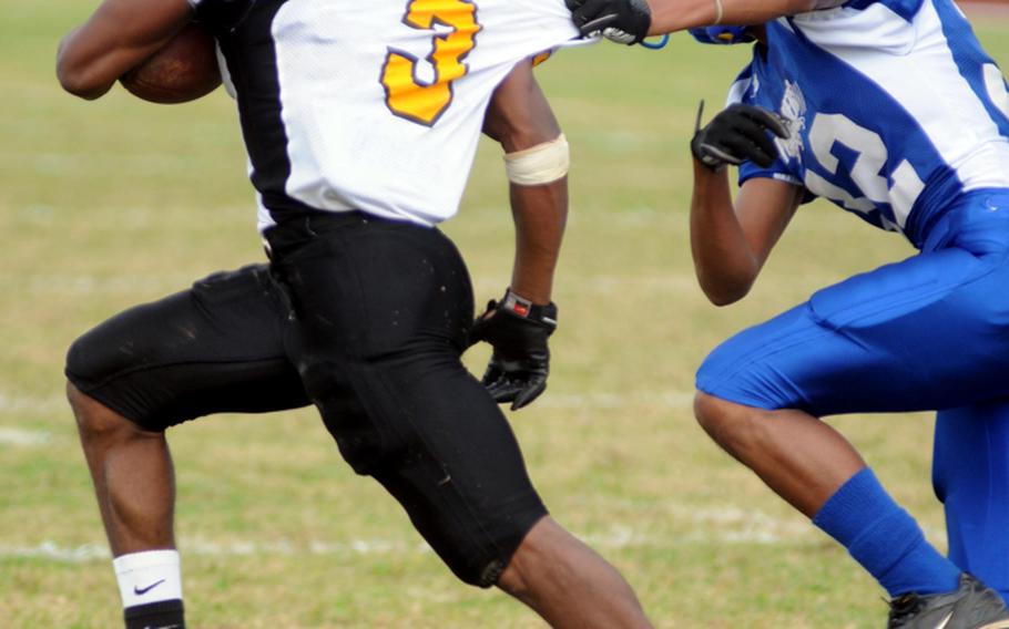 Free safety Myles Andrews and the Yokota Panthers defense saw a lot of Kadena Panthers running back Shariff Coleman's backside during most of Friday's Far East High School Division I football championship game at Mike Petty Stadium, Kubasaki High School, Camp Foster, Okinawa. Coleman ran for 183 yards and two touchdowns on seven carries as Kadena routed Yokota, 50-23, for its second straight title and third in four years.