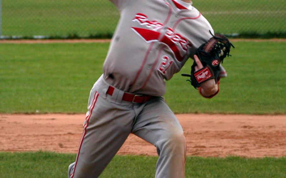 Winning Kaiserslautern pitcher Aaren Blossom delivers a fastball during game one of a doubleheader against the Lakenheath on Saturday at RAF Feltwell, England. The Raiders won both games 8-1 and 5-1.