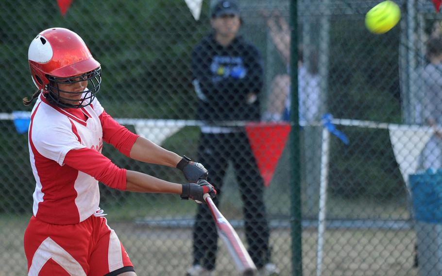 Kaiserslautern's Reagan McCurn connects for a three-run triple in a late rally against Ramstein. Her effort was for naught as the Raiders came up short, losing to Ramstein 10-7.