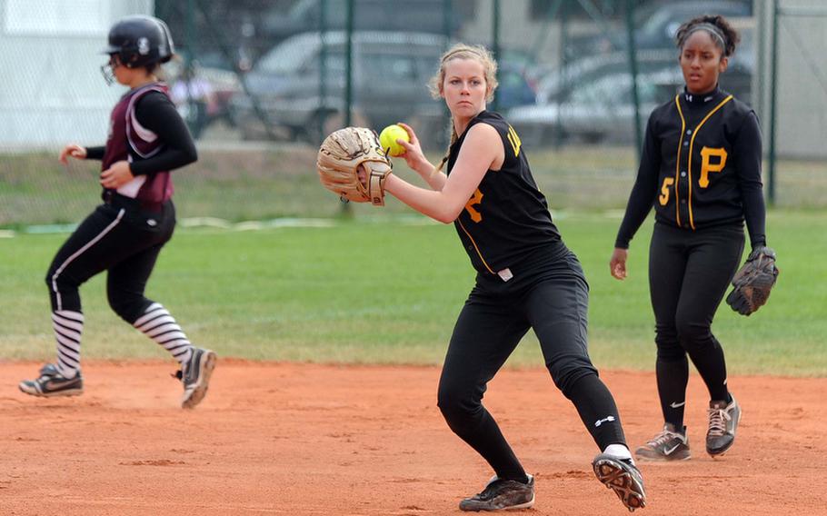 Patch's Shannon Wright prepares to throw to first after fielding a Vilseck ground ball early in a Division I semifinal at the DODDS-Europe softball finals. Patch won 10-9. At right is Bianca Lopez.