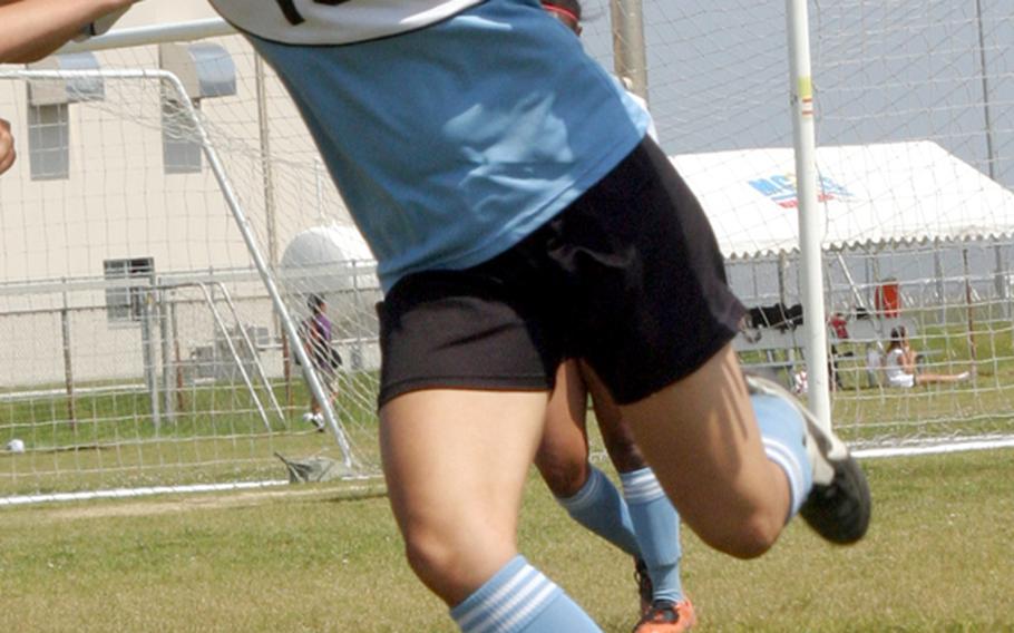 Osan American Cougars senior sweeper Alina Hauter, Far East Girls Division II Soccer Tournament Most Valuable Player and Stars and Stripes girls high school Pacific Player of the Year.