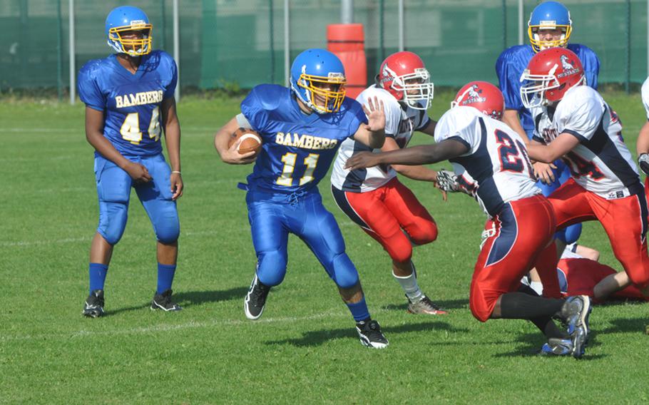 Bamberg senior Eric Ozuna evades the Mustang defense Saturday.