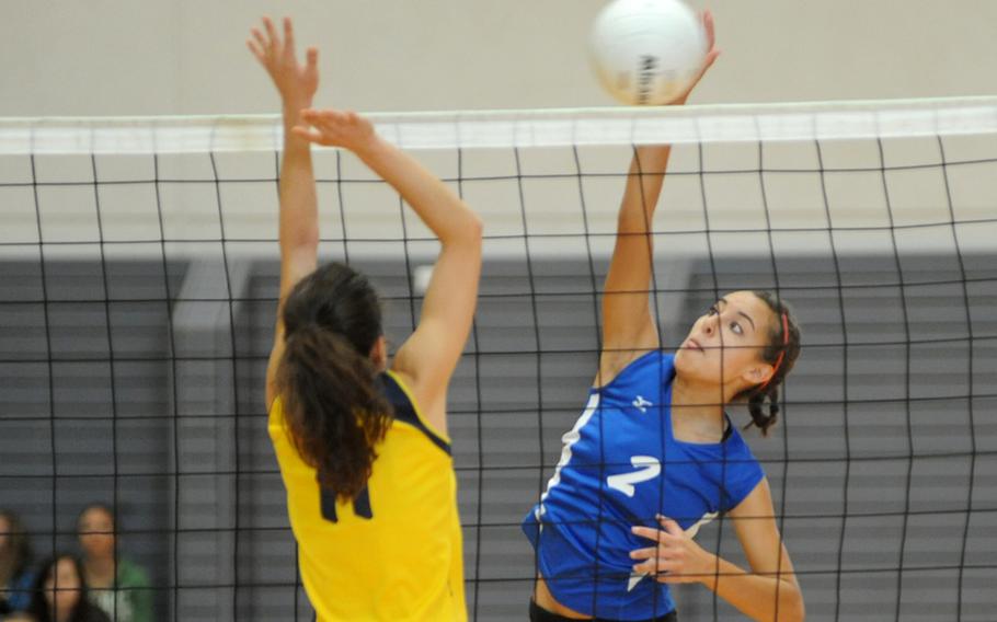 Rota's Aspen Luna, right, hits the ball against Florence at the DODDS-Europe volleyball finals on Nov. 5. Luna has been selected as the Stars and Stripes Athlete of the Year for volleyball.