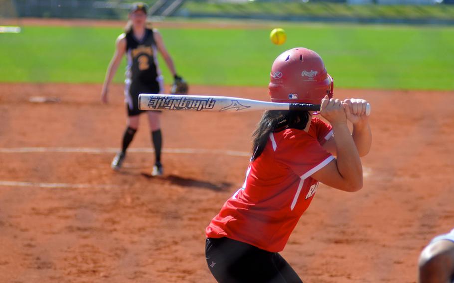 Schweinfurt's Abby Bernardino receives a pitch from Patch's Katelyn Tingey during the first game of a doubleheader Saturday at Patch Barracks.