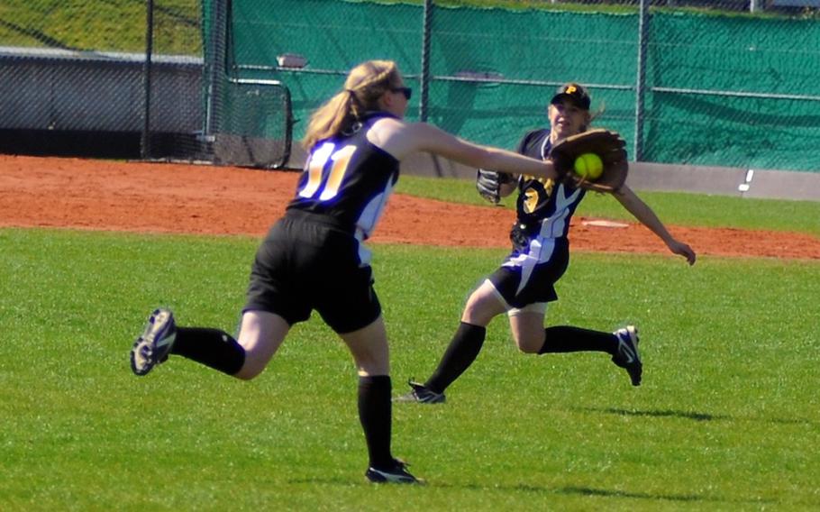 Patch's Haile Baker catches a fly ball during the first game of a doubleheader Saturday at Patch Barracks.