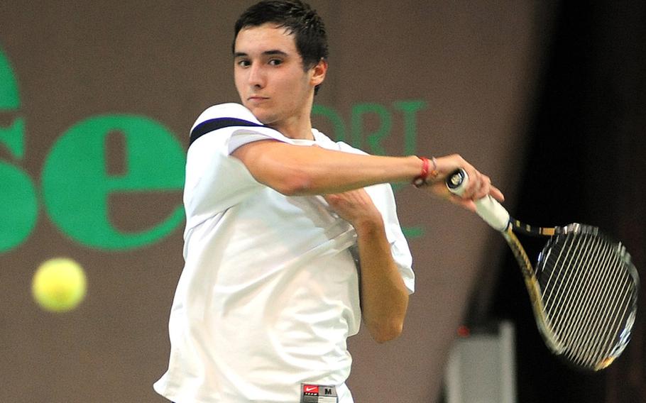 Ajdin Tahirovic returns a ball from SHAPE's Dimitrios Stavropoulos in his 6-4, 6-3 victory in the boys single match at last year's DODDS-Europe tennis championships in Wiesbaden. He will be back this season, trying to make it three titles in a row. 
