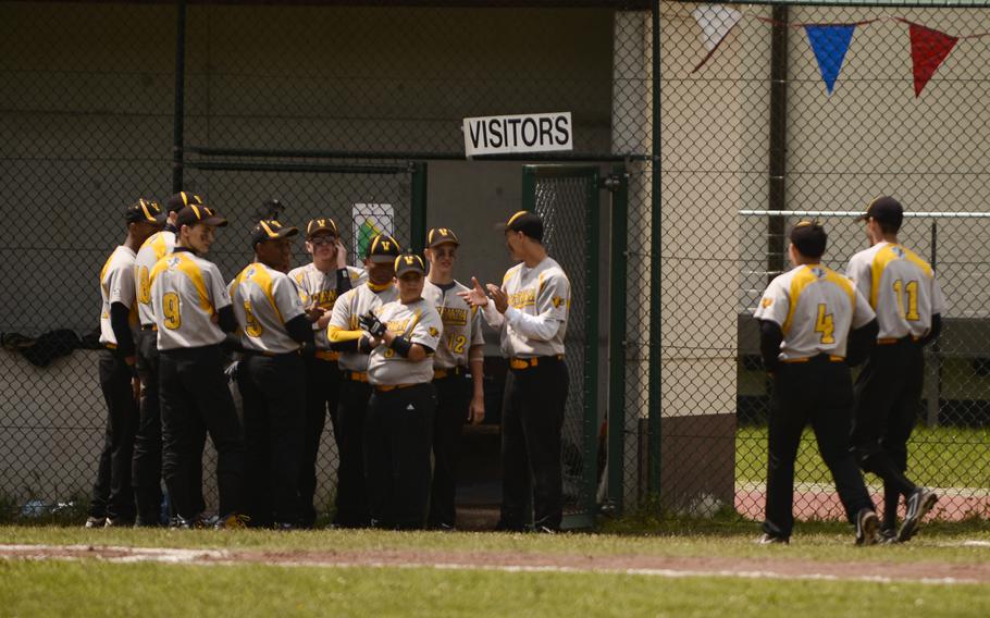 Vicenza huddles outside their dugout before playing Naples for the Division II & III championship game Saturday afternoon in the 2013 DODDS-Europe baseball championships at Ramstein Air Base, Germany.