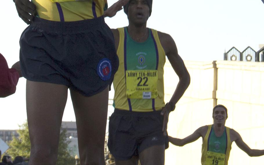 The first three runners to arrive at the 29th annual Army 10-Miler finish line represented Brazil. The runners were: Solonei Silva, No. 24, 1st place, 48:04; Paulo Paula, No. 22, 2nd place, 48:06; Frank Caldeira, No. 19, 3rd place, 48:08.