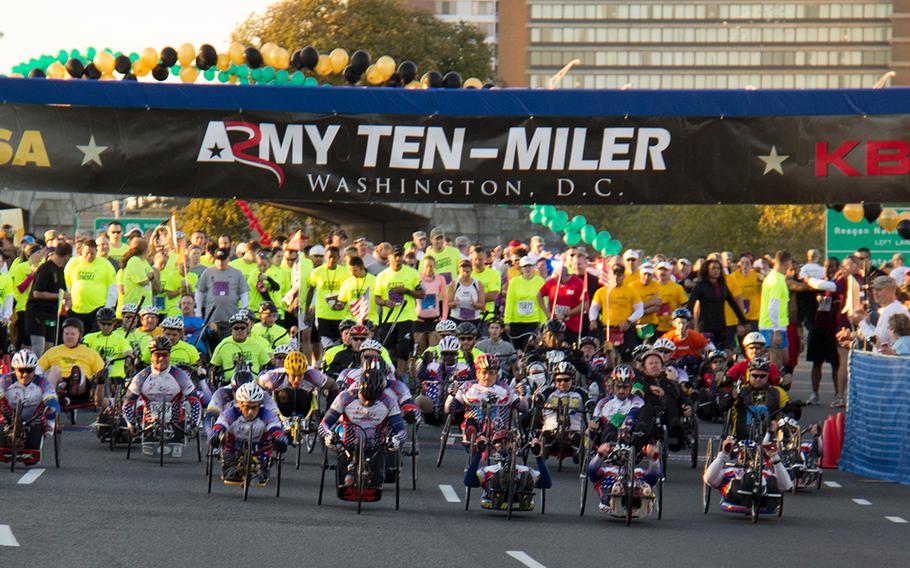 Wounded Warriors get on their way at the 29th annual Army 10-Miler, October 20, 2013.