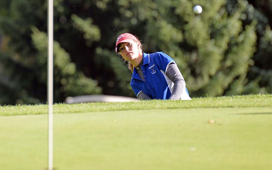 Wiesbaden's Jenna Eidem chips to the green on her way to winning her third straight DODDS-Europe girls golf title at Wiesbaden, Germany, Oct. 10, 2013.