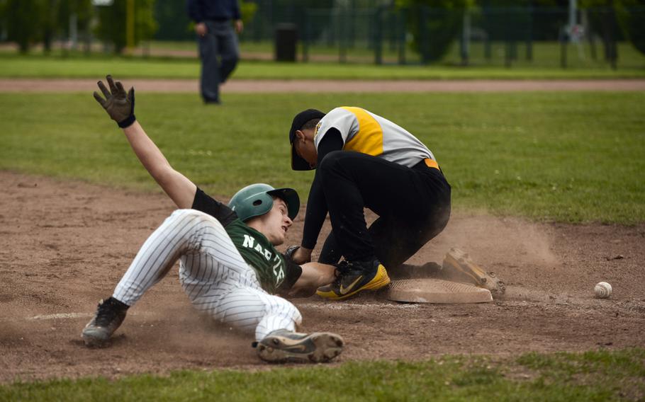 Naples' Joseph Pitts steals third base in the Division II & III championship game at the 2013 DODDS-Europe baseball championships at Ramstein Air Base, Germany, May 25, 2013. The game was the first time two Italy-based teams had played for a European baseball crown. 