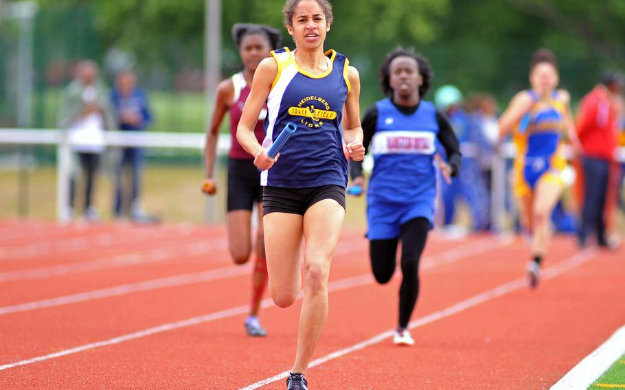 Shanice Harmon sprints down the track as she anchors Heidelberg's 4 x 400-meter relay team, giving the school its final sports victory in its history. She teamed up with Courtney Morgan, RaeannAnn Stark and Adellah Summerlin to win in 4 minutes, 11.64 seconds at the DODDS-Europe track and field championships in Kaiserslautern, Germany, May 25, 2013. Heidelberg High School closed at the end of the school year.
