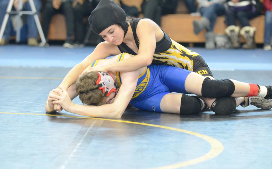 Patch's McKenna Fields gets control over Sigonella's Kyle McCullough Saturday during a 113-pound match at the Southern sectional qualifier at Vicenza, Italy. Fields was the only female wrestler at the meet and earned a spot at the European Championship.