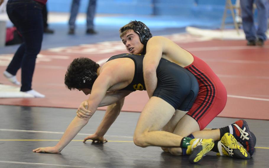 Aviano's Daniel Dinges secures a hold on Vicenza's Marshall Perfetti Saturday, during a 160-pound Southern sectional qualifier match at Vicenza, Italy. Dinges won 15-7 and earned a spot at the European Championship in Germany.
