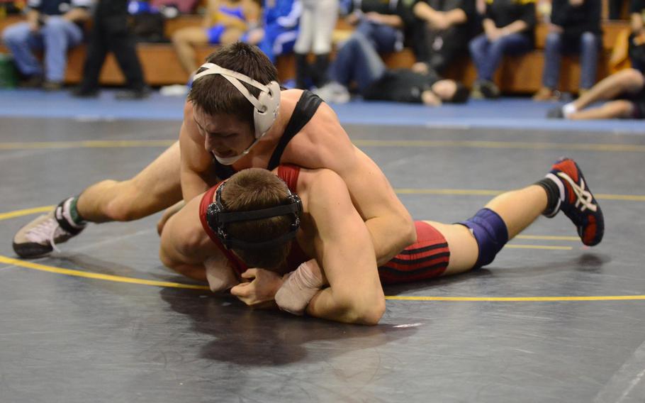 Vilseck's Will Peters secures a hold on Aviano's Daniel Dinges Saturday, during a 160-pound Southern sectional qualifier match at Vicenza, Italy. Peters pinned Dinges in 2:55 for first, both earning a spot at the European Championship in Germany.