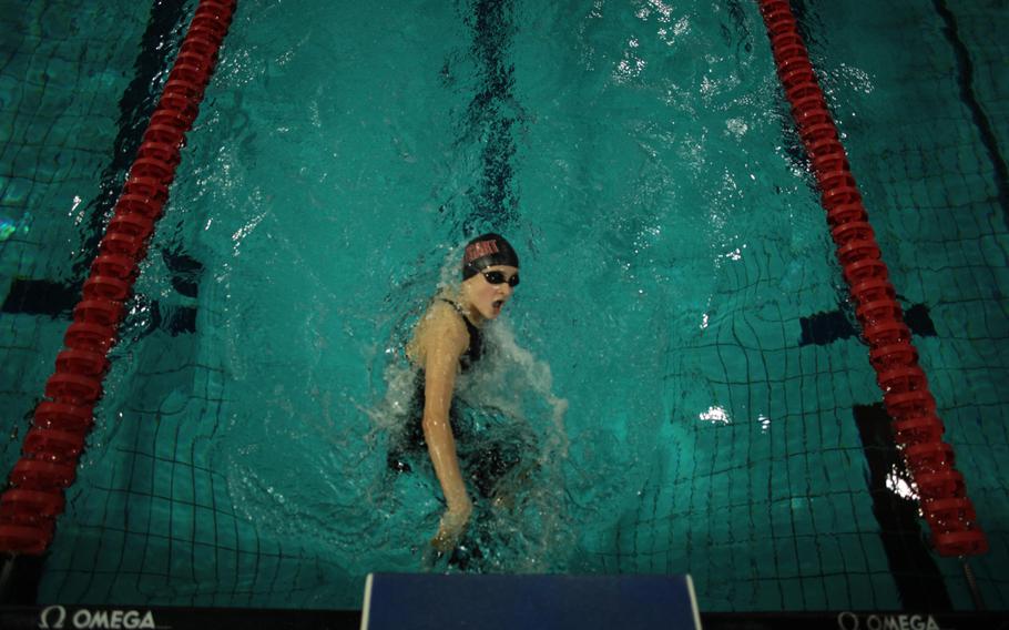 Stuttgart's Katie Nugent kicks off the wall on a turn in her winning 200-meter individual medley swim Sunday, Feb. 16, 2014, at the European Forces Swim League championships in Eindhoven, Netherlands. 