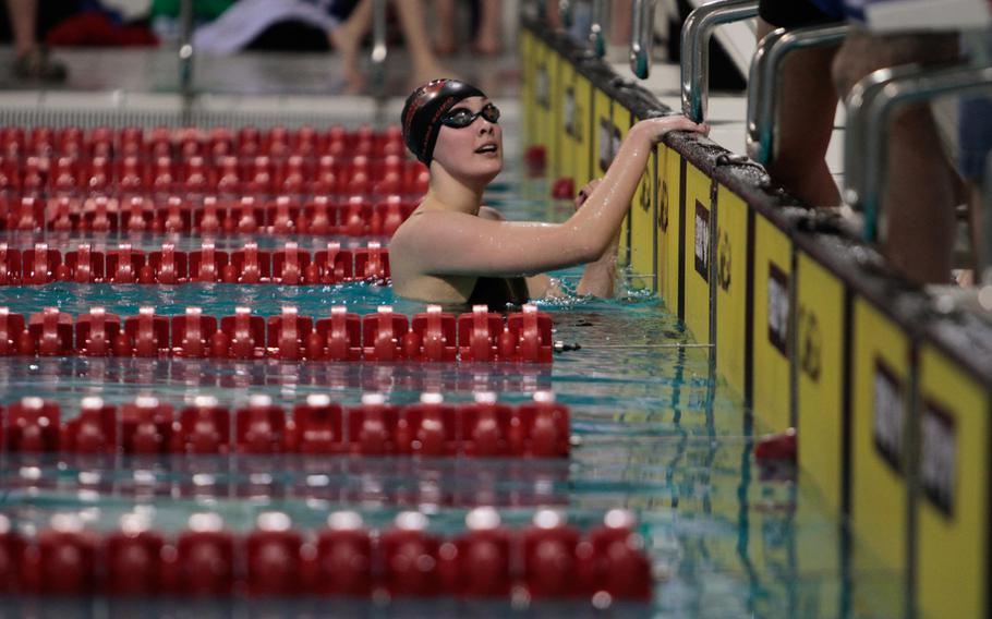 Alaina Scifo, 16, of Lakenheath, waits for her competition to finish the race after finishing well ahead of the pack in the 200-meter individual medley Sunday, Feb. 16, 2014, at the European Forces Swim League championships in Eindhoven, Netherlands. 