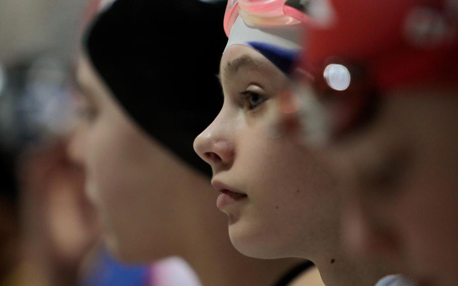 Aviano's Katelyn Vroom waits with other 10-year-old girls to be called forward to race Sunday, Feb. 16, at the European Forces Swim League championships in Eindhoven, Netherlands.