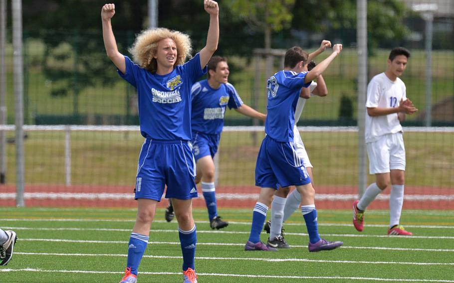 Sigonella's Dylan Van Wynsberghe, left, and other members of the Jaguars celebrate the Division III title after defeating Brussels 4-3 in Kaiserslautern, Germany, Thursday May 22, 2014.