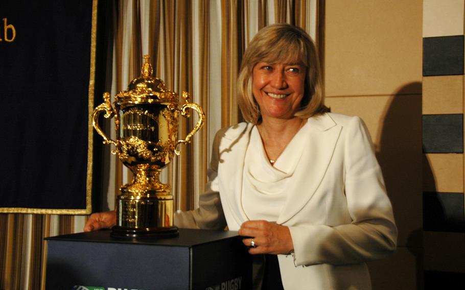 Debbie Jevans, chief executive of England Rugby 2015, shows off the Webb Ellis Cup in Tokyo on Monday, May 26, 2014.