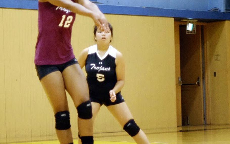 Zama's Destiny Howze returns a volley during the Trojans' visit to American School in Japan Sept. 23. Howze led her team with three service aces and a spike kill in her team's 25-13, 25-10, 25-8 loss.