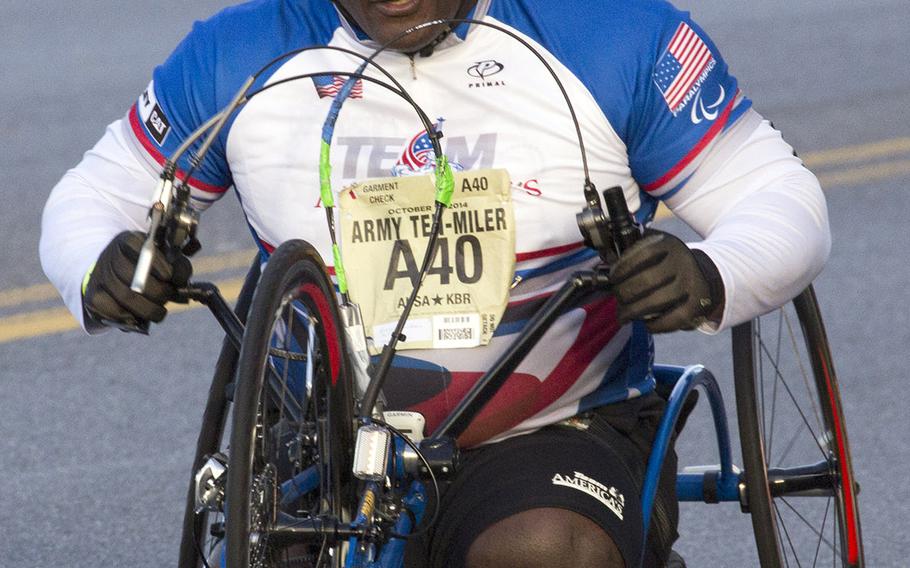 Retired Army Col. Gregory Gadson, who most recently served as garrison commander at Fort Belvoir, Va., competes in the Army Ten-Miler, Oct. 12, 2014.