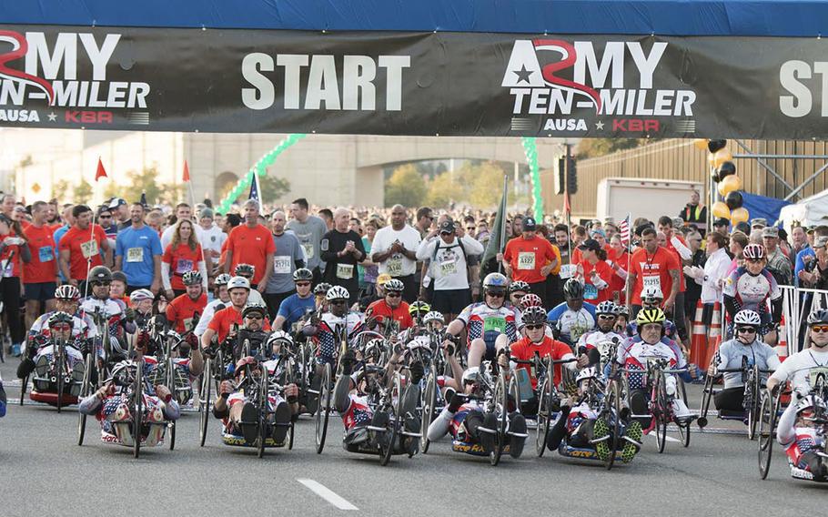 Army Ten-Miler hand cyclist start their trek towards the finish line, October 12, 2014.