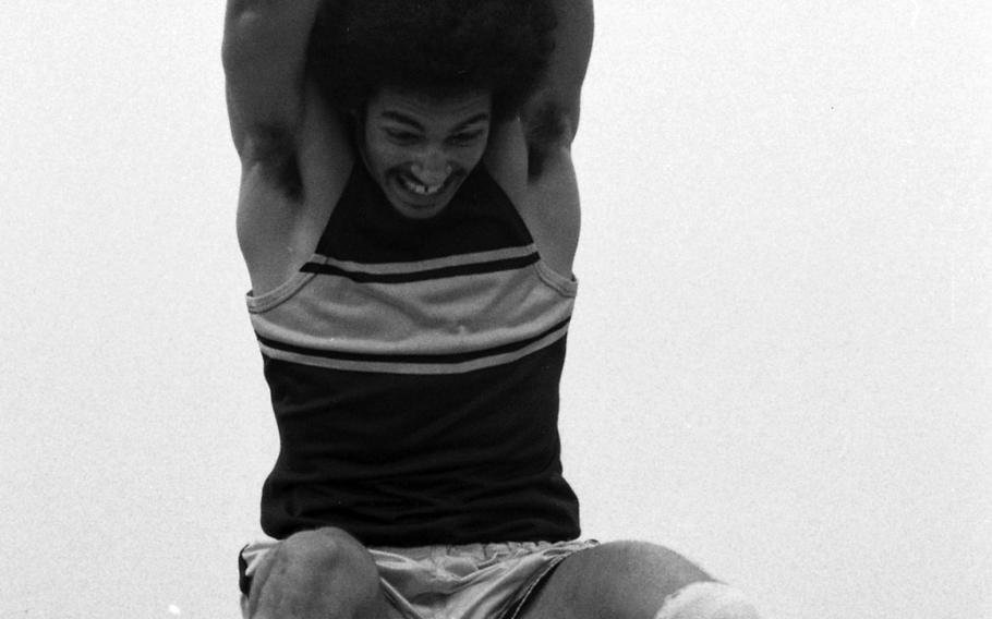 Frankfurt's Doug Henderson leaps 22 feet, 11.5 inches to set a record at a regional track meet at Rhein-Main Air Base, Germany on May 4, 1974. Later in the season he jumped 23 feet, 8 inches, a record still stands today.