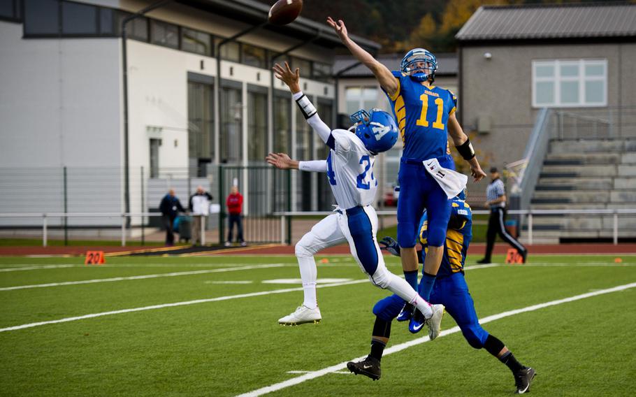 Ansbach Cougar Bailey Ward leaps to disrupt a pass during the DODDS-Europe Division II football championship at Vogelweh, Germany, on Saturday, Nov. 7, 2015. The Cougars defeated the Rota Admirals 32-27. 
