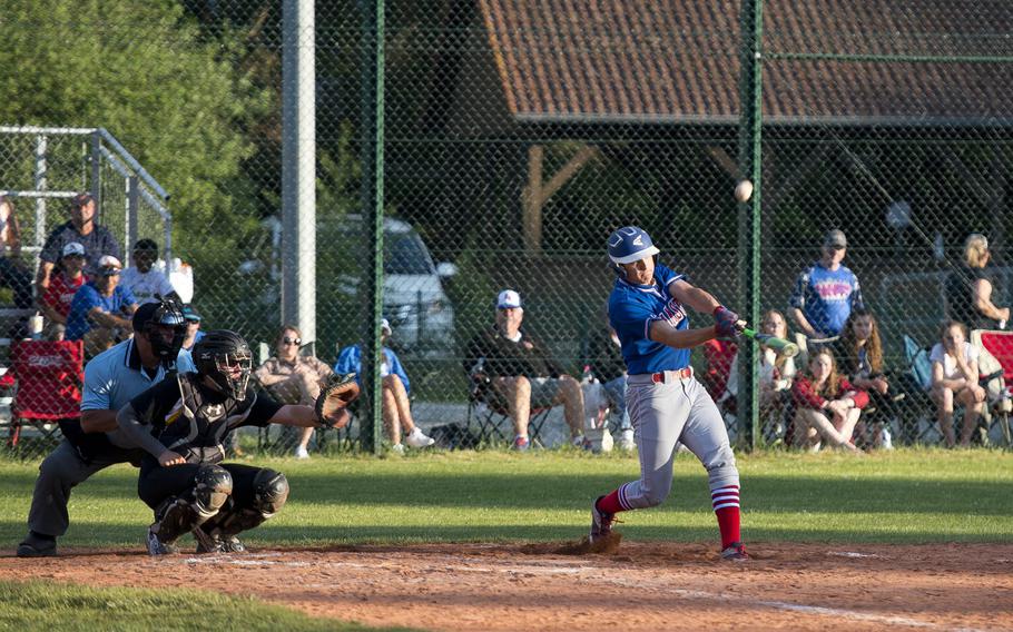 Ramstein's Kyle Glenn hits the ball during the DODEA-Europe baseball tournament in Kaiserslautern, Germany, on Thursday, May 25, 2017. Ramstein won the Division I game against Vicenza 9-2.
