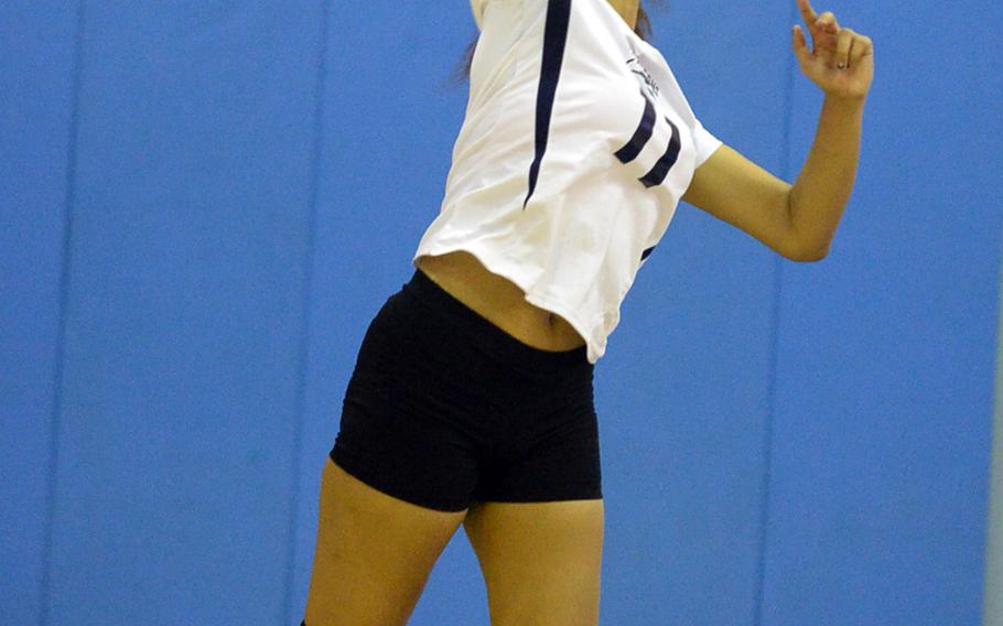 Ebony Dykes, a junior who's never played volleyball before, is trying her hand as a middle for Seoul American girls volleyball.