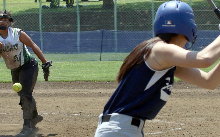 Kubasaki right-hander Makayla Major delivers against Seoul American during Monday's round-robin game in the Far East Division I softball tournament. The Dragons won all three round-robin games and outscored their foes 40-0.
