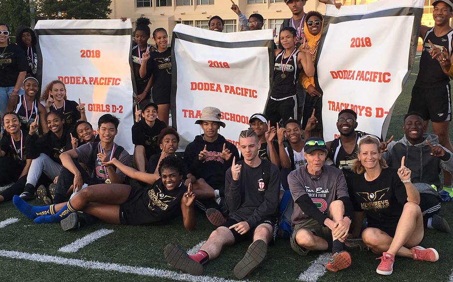 Humphreys track and field athletes celebrate the first sweep of Far East Division II banners in school history.
