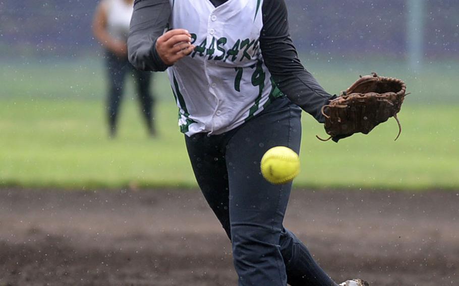 Tournament Most Valuable Player Olivia Witherow of Kubasaki delivers against Nile C. Kinnick in Wednesday's final, which the Dragons won 13-3.
