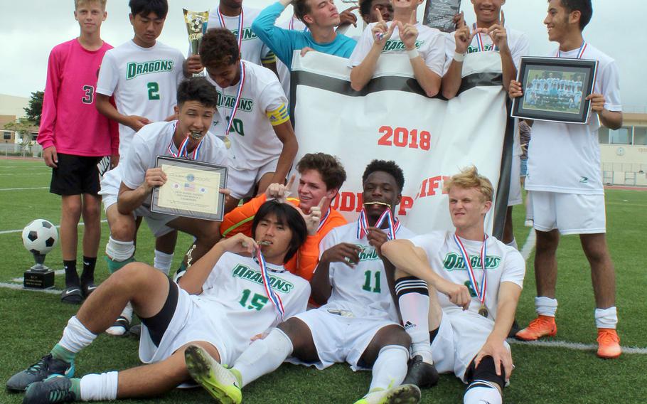 Celebration time for Kubasaki boys soccer, which for the second time in three years won the Far East Division I Tournament title.
