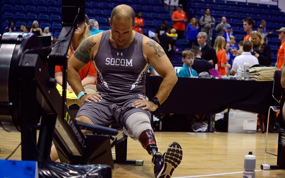 Army 1st Sgt, Jarrid Collins from Team SOCOM rests before the indoor rowing competition during the 2018 Warrior Games held at the Air Force Academy in Colorado Springs June 9, 2018. 