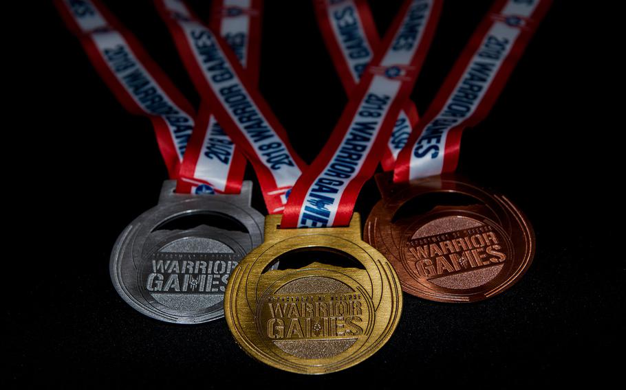 The Gold, Silver and Bronze medals are displayed during the DoD Warrior Games archery competition, June 7, 2018, at the U.S. Air Force Academy in Colorado Springs, Colorado. 