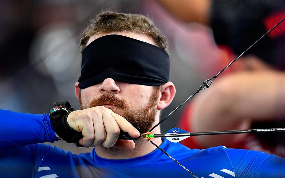 Team Air Force member Brett Campfield competes in the Department of Defense Warrior Games archery competition at the U.S. Air Force Academy, Colorado Springs, Colorado, June 7, 2018. 