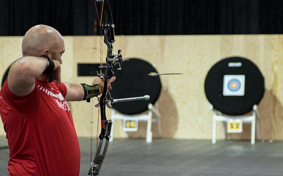 U.S. Marine Corps veteran Charles Dane of Team Marine Corps fires an arrow during the DoD Warrior Games archery competition, June 7, 2018, at the U.S. Air Force Academy in Colorado Springs, Colorado.