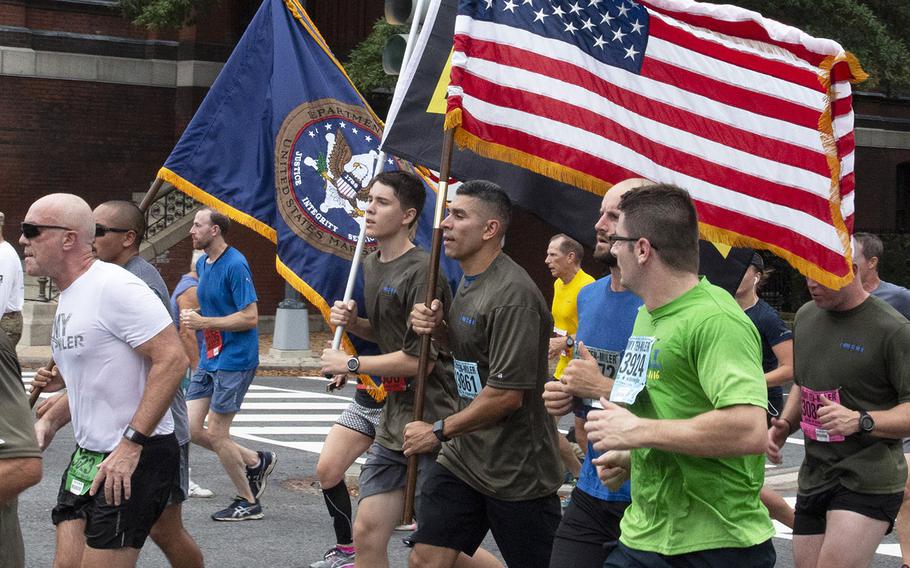 Soldiers carry the colors during the Army Ten-Miler in Washington, D.C., Oct. 7, 2018.