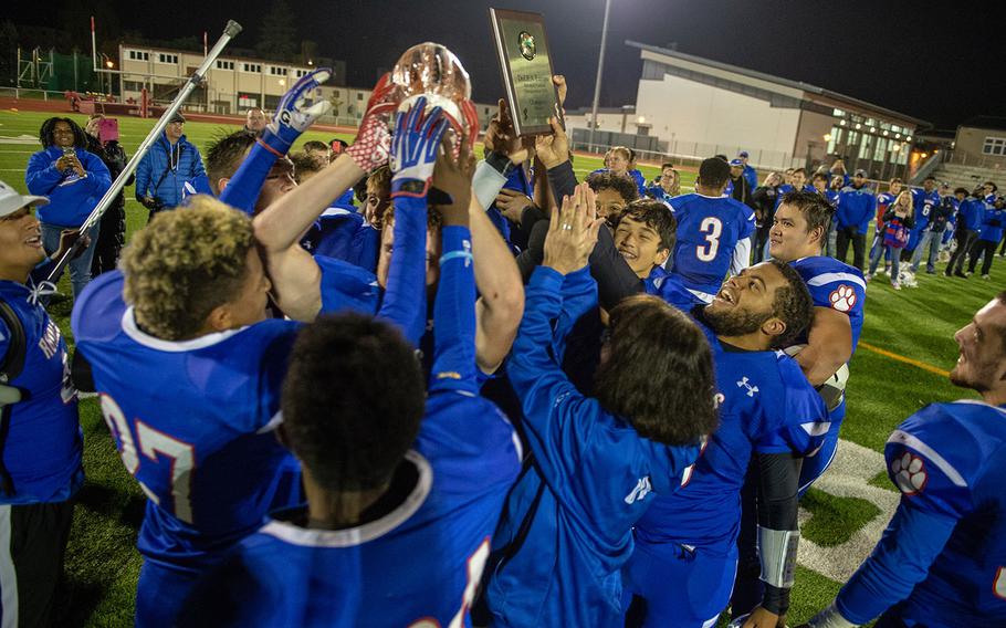 The Ramstein Royals celebrated after being crowned the DODEA-Europe Division I football champions after playing the Lakenheath Lancers in a game, Saturday, Nov. 3, 2018. 