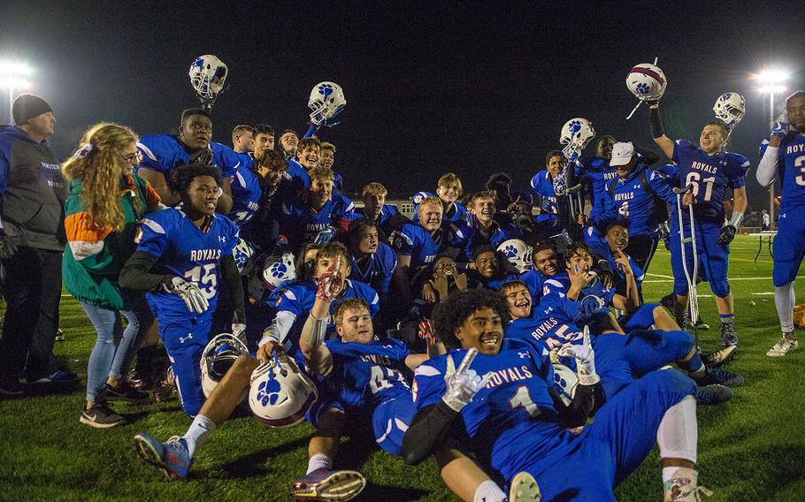 The Ramstein Royals celebrate after being crowned the DODEA-Europe Division I football champions after playing the Lakenheath Lancers in a game, Saturday, Nov. 3, 2018. 